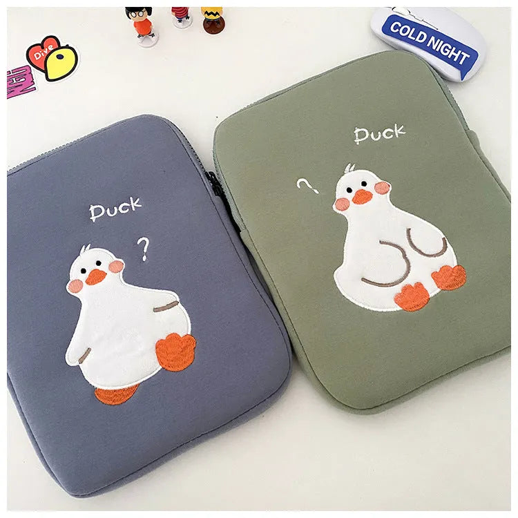 Blue cotton tablet case with cartoon duck embroidery design and zipper closure