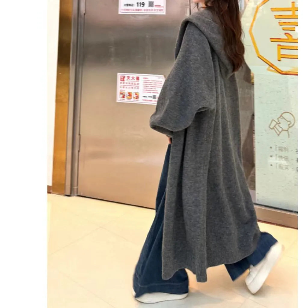 Women's longline knitted hooded cardigan in brown, loose fit Korean casual style.