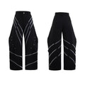 Men's black polyester trousers with metal striped rivet decoration and pleats, showing three-dimensional cut.