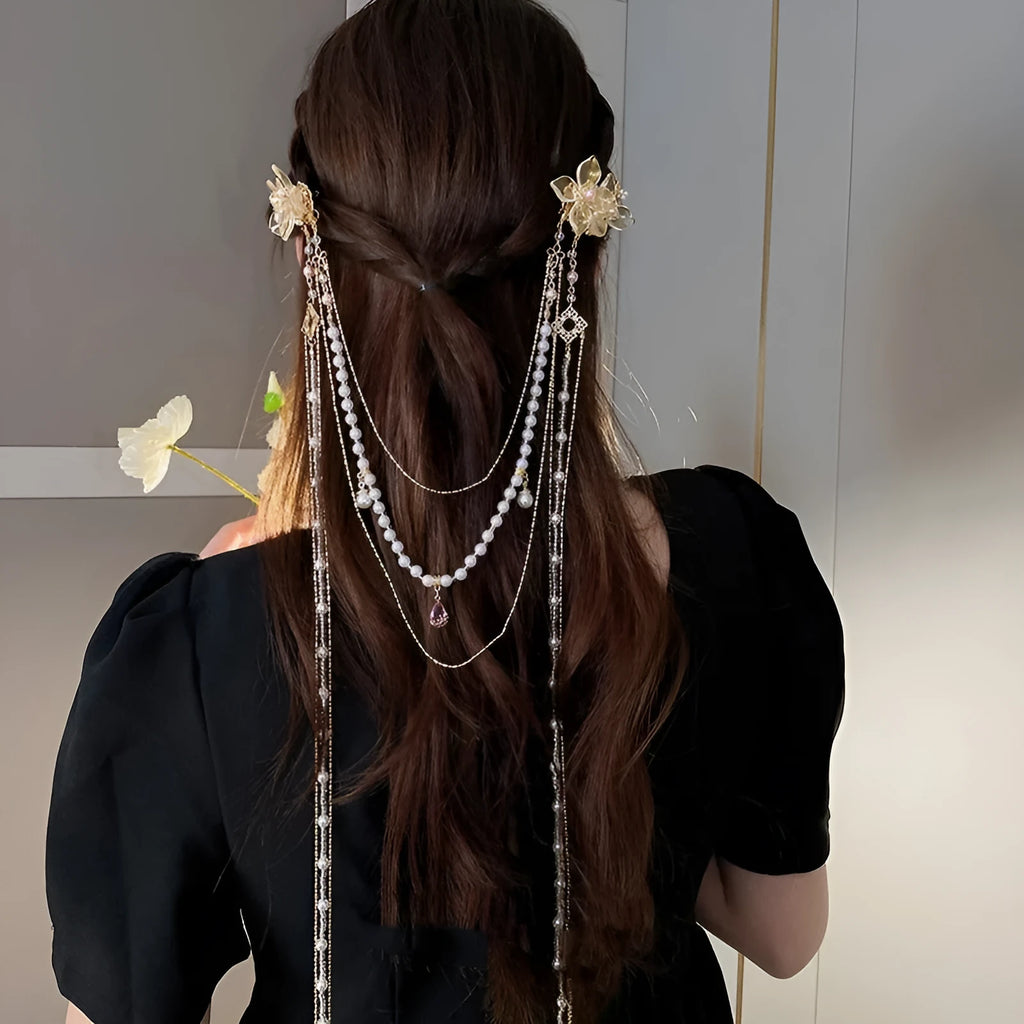 Gold grip women's hairpin with pearl and diamond flower design and long tassel decorations
