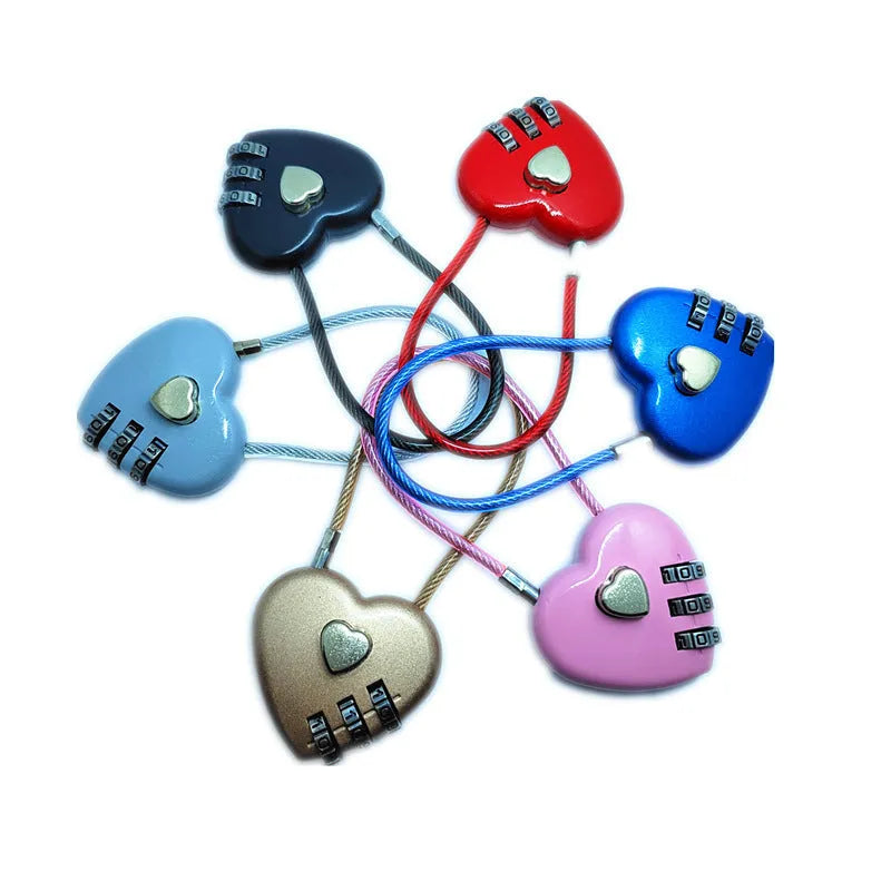 Peach heart design wire rope cable lock in red with steel rope, shown securing a bicycle helmet.