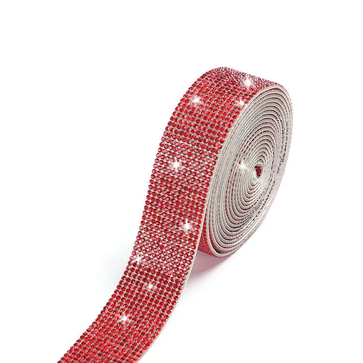 A long strip of electroplated glass self-adhesive water drill for clothing decoration in white and AB colour.