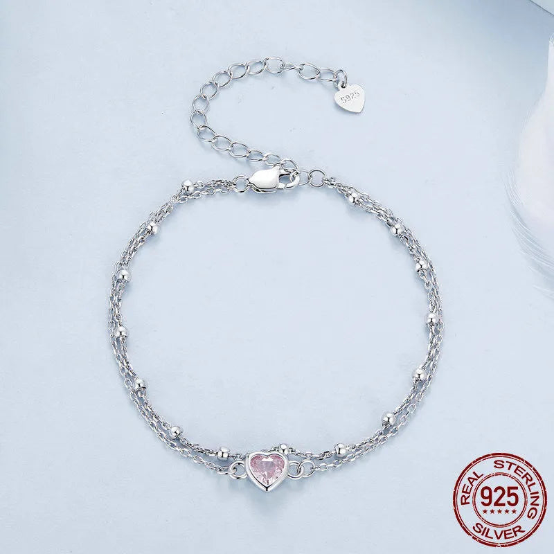 Women's sweet style 925 sterling silver bracelet with a small heart-shaped pendant on an adjustable chain.