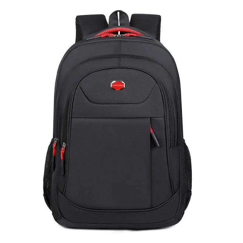 Oxford cloth backpack in solid colour with curved shoulder straps, shown with multi-layer compartments open