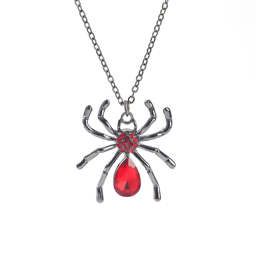 Close-up of a dark electroplated zinc alloy Halloween necklace pendant featuring a spider and bat design on a regular chain.