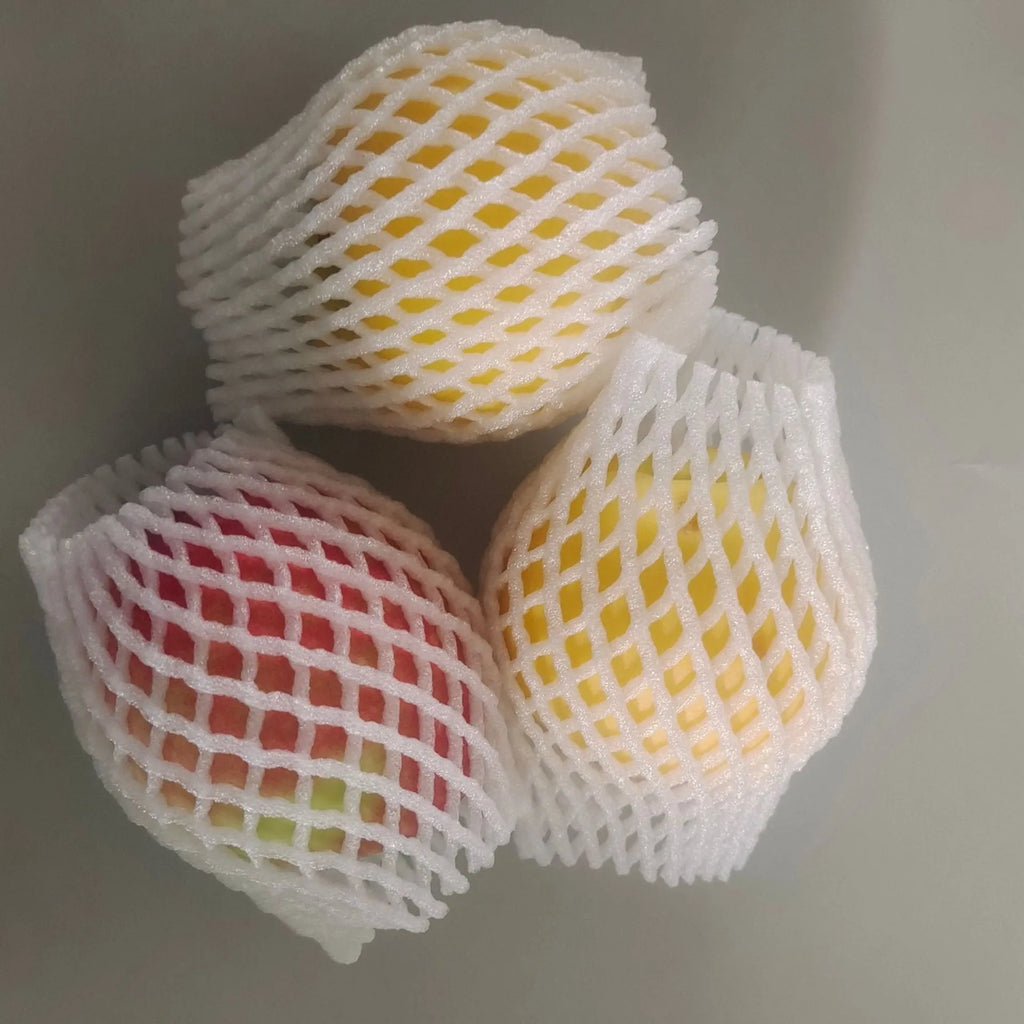 White foam fruit protection nets showing different sizes for apples, pears and peaches