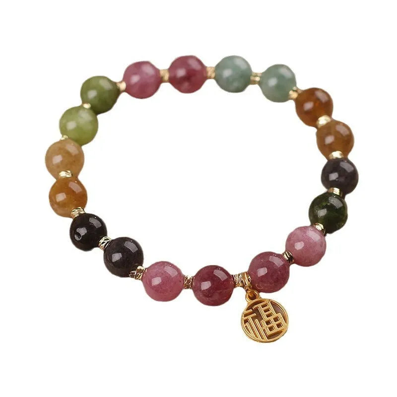 Natural colour tourmaline bracelet with floral and fu character designs and electroplated finish