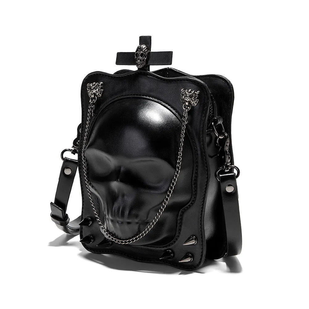 Black gothic skull shoulder bag with square messenger shape and decorative metal details