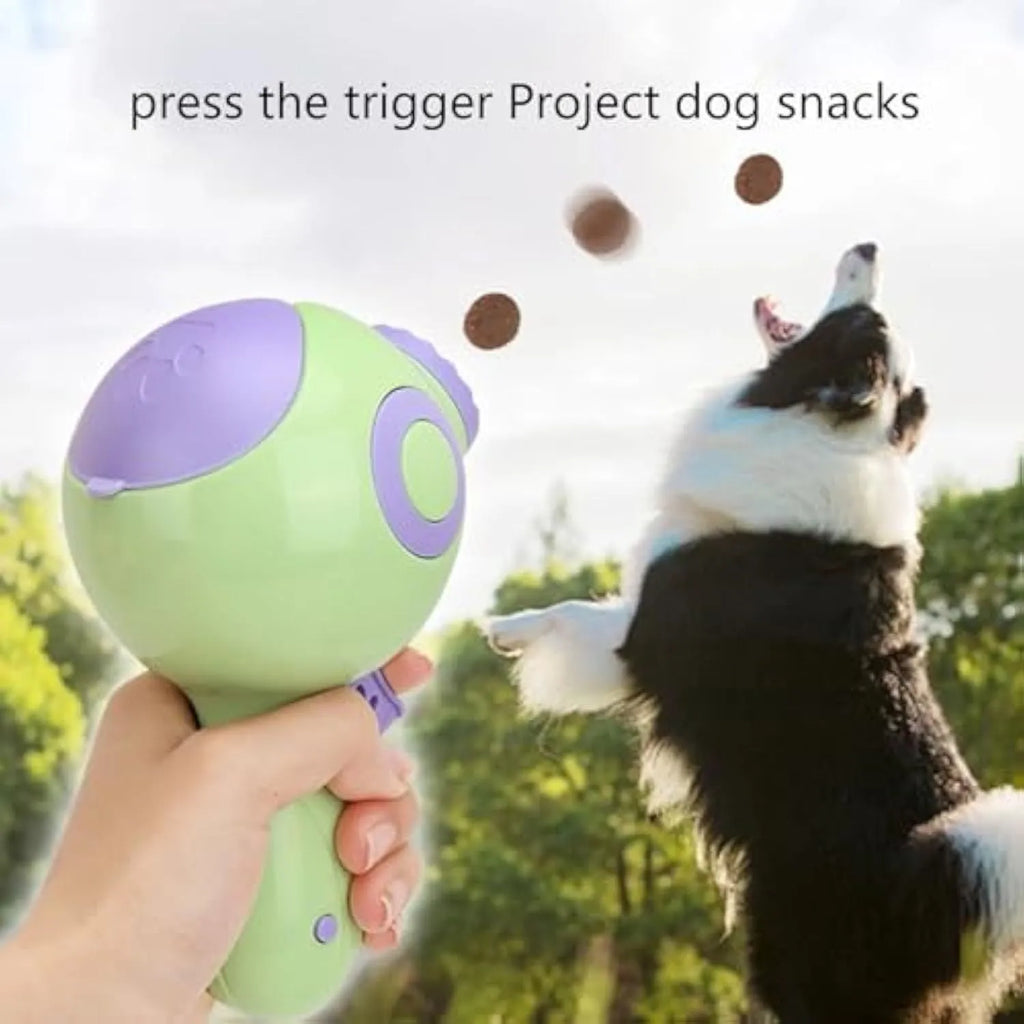Green, orange or pink dog treat launcher toy for interactive feeding and training