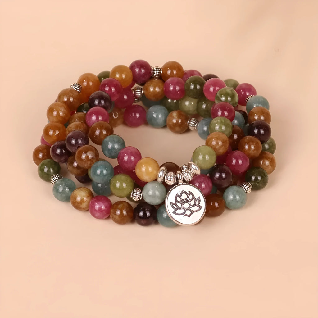 108 bead multi-layer bracelet with hanging lotus design in tourmaline colour