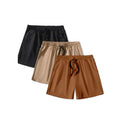 Men's black, khaki, and light brown elastic drawstring shorts laid flat, showing loose fit and adjustable waistband.