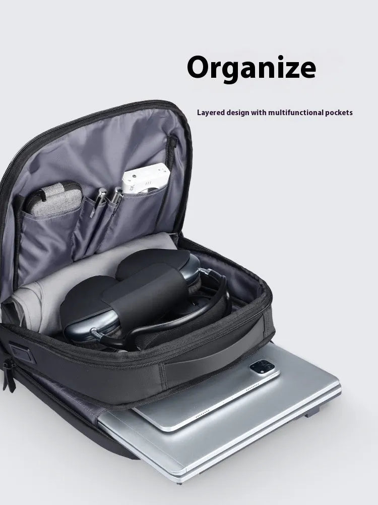 Graphite grey USB charging business backpack with Oxford cloth exterior and visible stitching