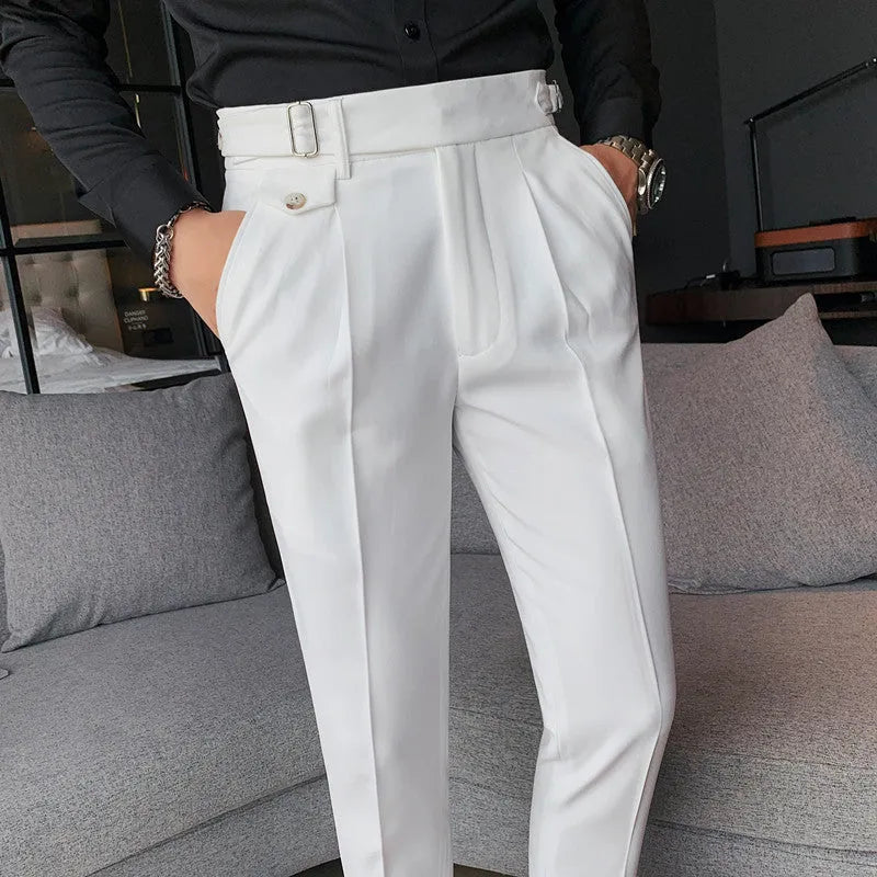 Men's straight-leg casual trousers in solid colours like black, grey, and khaki.