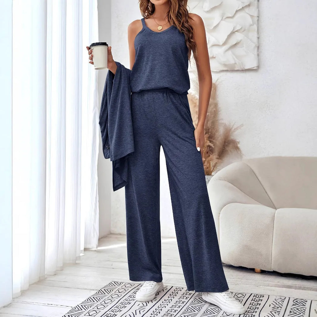 Blue women's three-piece casual suit set comprising sling top, long cardigan, and trousers on a hanger.
