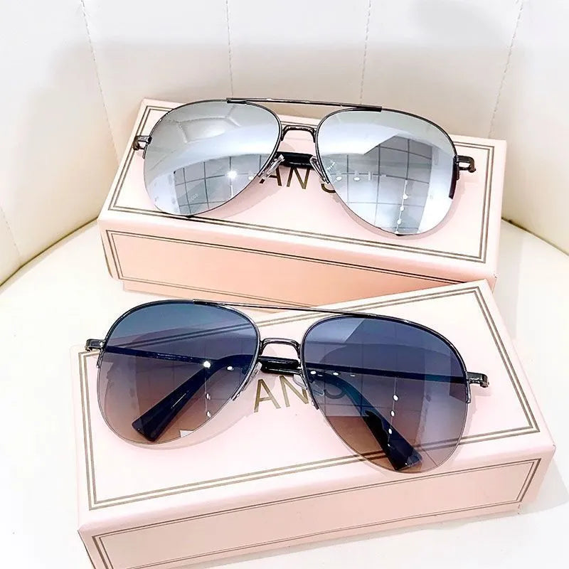 Metal aviator sunglasses with UV protection resin lenses in various colour options.