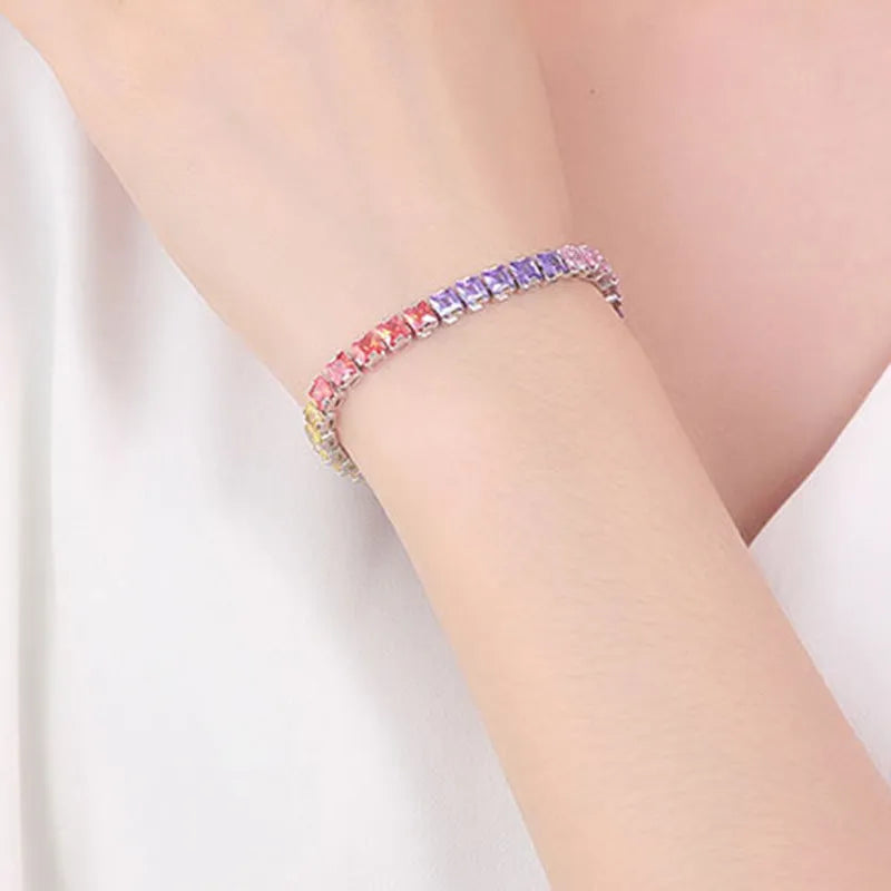 Electroplated real platinum square diamond bracelet with geometric design and gang drill elements in zircon