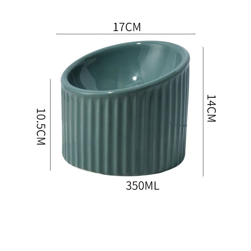 Elevated ceramic cat bowl in green colour showing raised, tilted design for food or water.