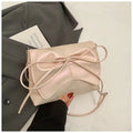 Women's black underarm crossbody bag with horizontal square design and crossbody strap