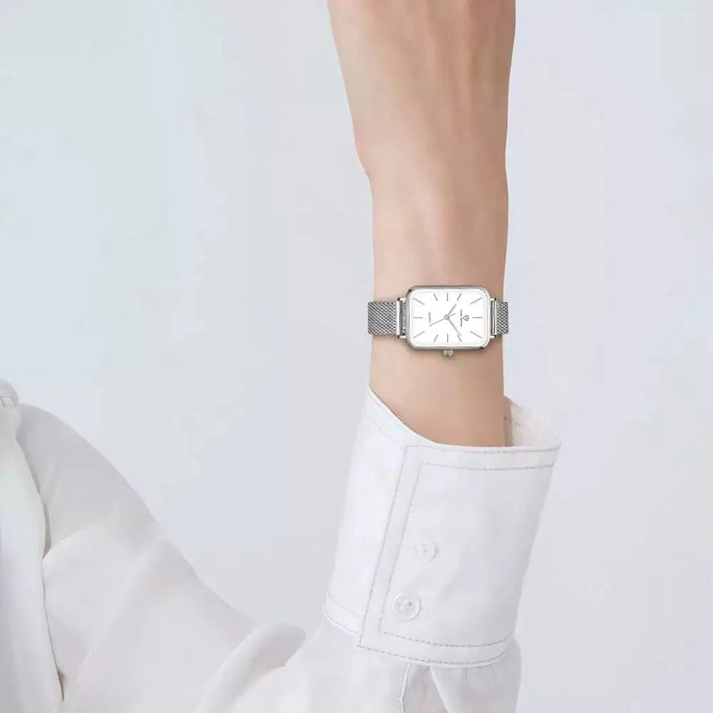Women's waterproof quartz watch with alloy case and woven steel strap in rose gold colour