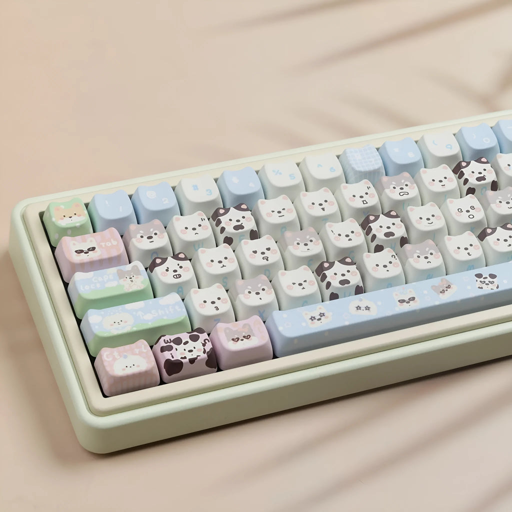 Complete set of PBT keycaps with cat and puppy sublimation designs for mechanical keyboards