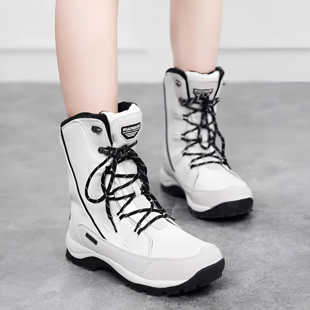 Women's black genuine leather waterproof snow boots with mid-calf length and non-slip rubber soles