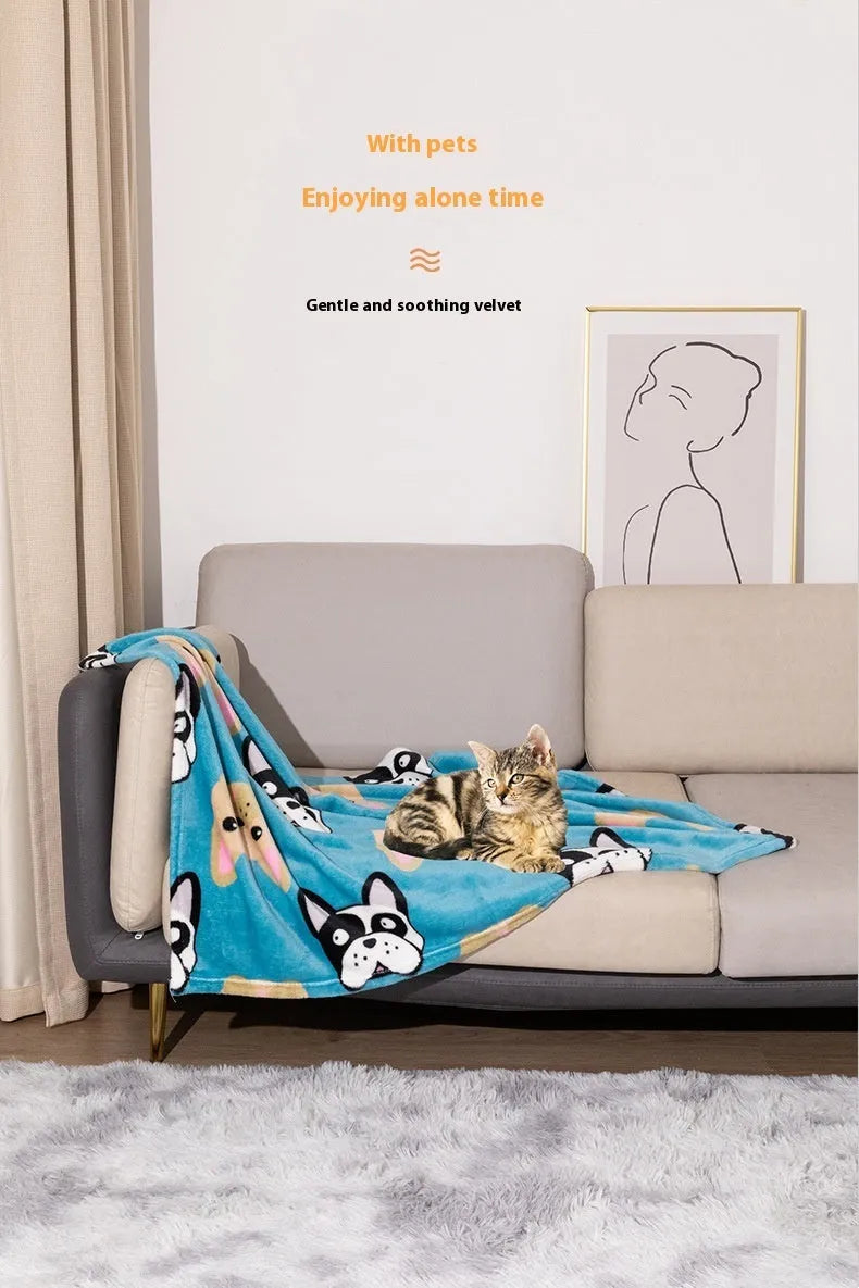 Blue cartoon dog pattern on a thick flannel pet blanket laid flat, showing its size as a dog kennel mat.