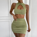 Light purple two-piece skirt set with hollow vest top and matching skirt for commuting wear