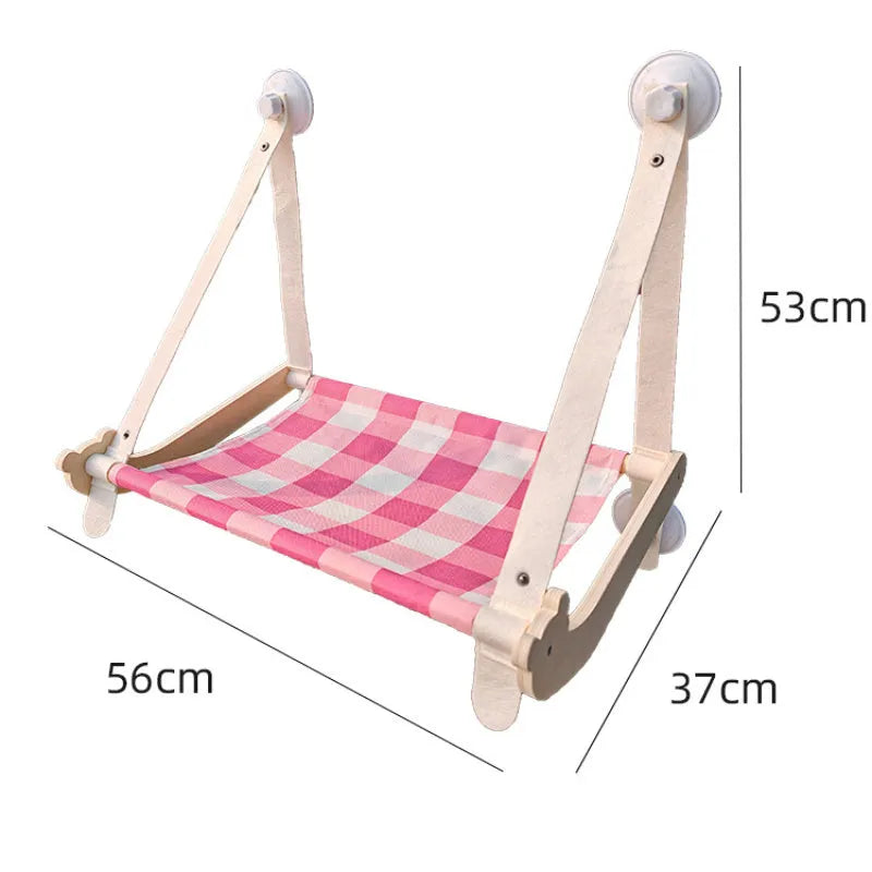 Wooden cat window hammock with linen fabric attached to window using suction cups