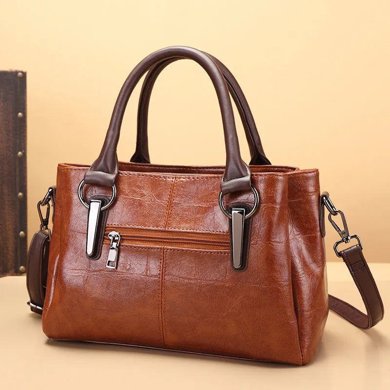 Horizontal square PU shoulder bag with open pocket and contrast stitching in black or brown colour options