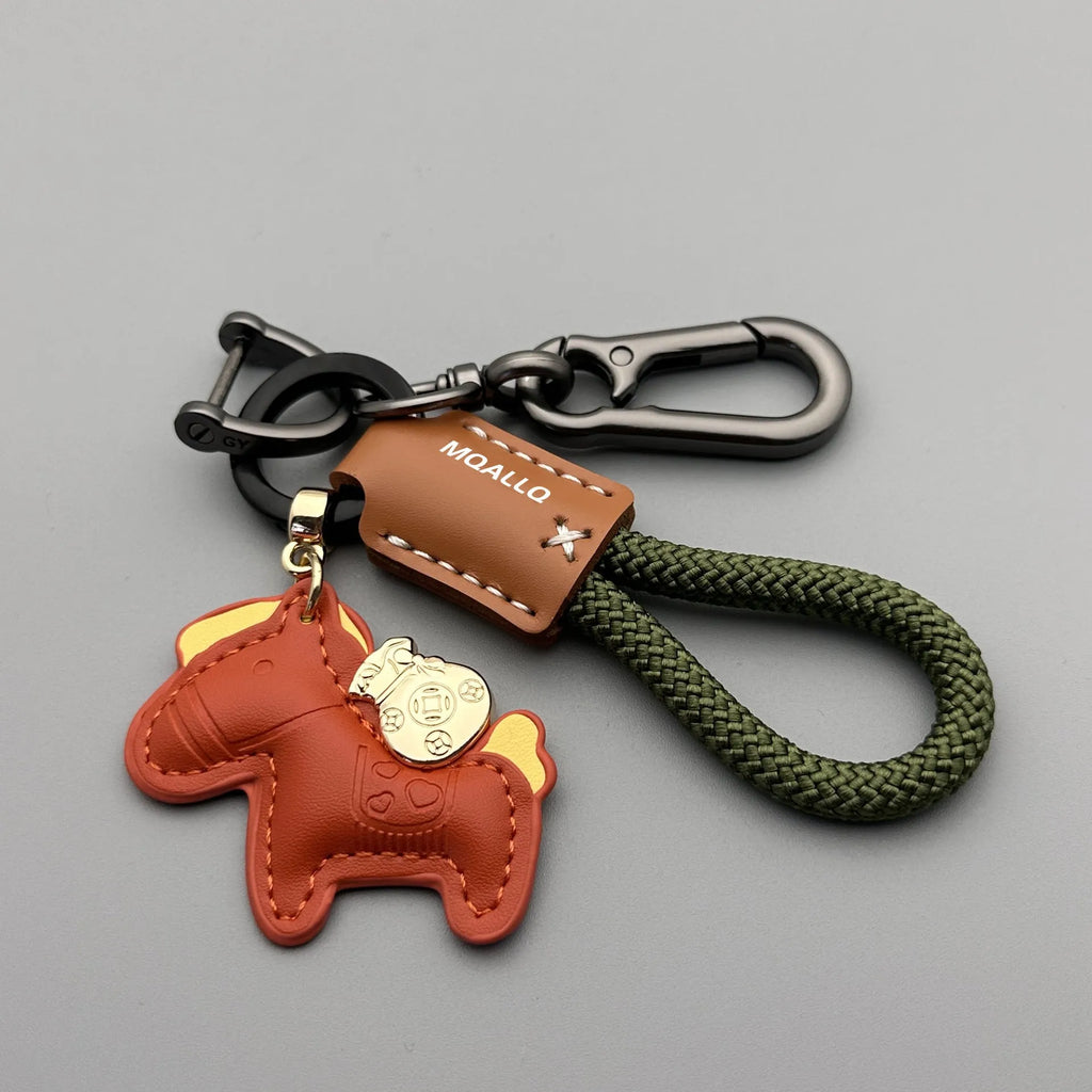 Cowhide car key ring pendant with zinc alloy pony belt buckle on flanelle rope in various colour options
