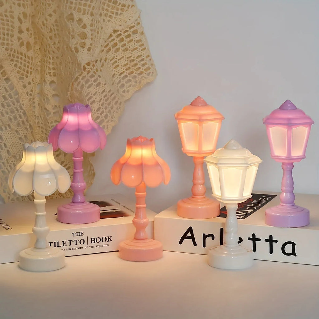 Retro pagoda-shaped small night lamp in light purple colour with geometric design.