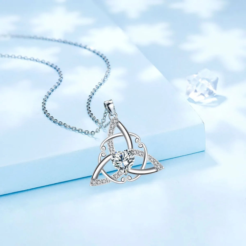 Sterling silver plated Celtic knot necklace for women with geometric pendant, available in four crystal colours.