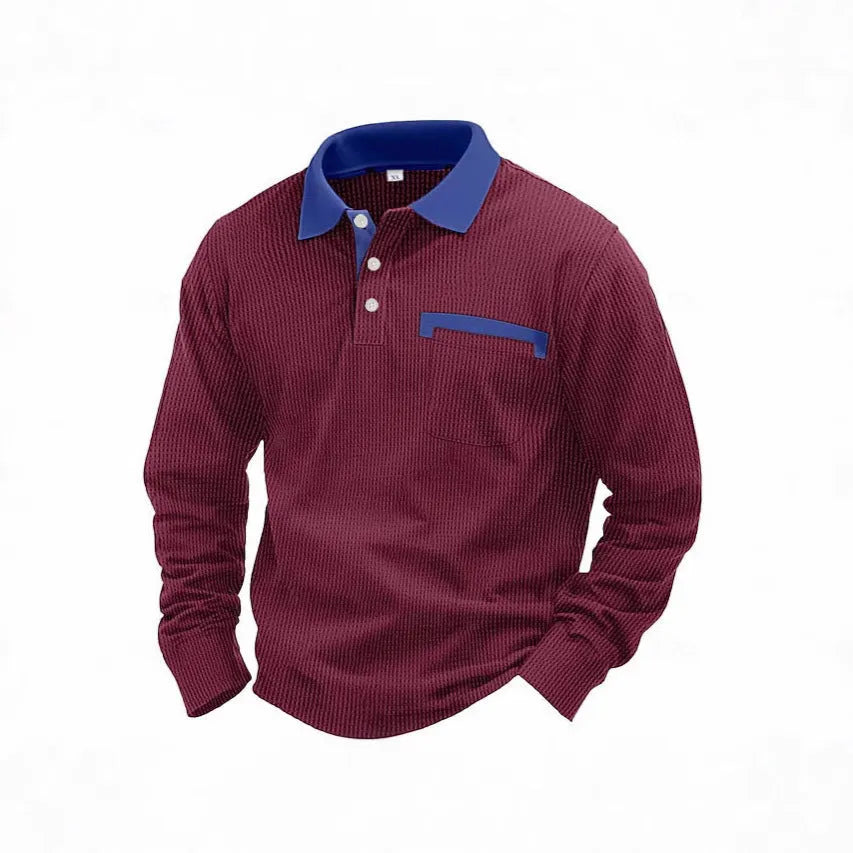 Man wearing a long-sleeved waffle knit polo shirt in a loose, retro style.