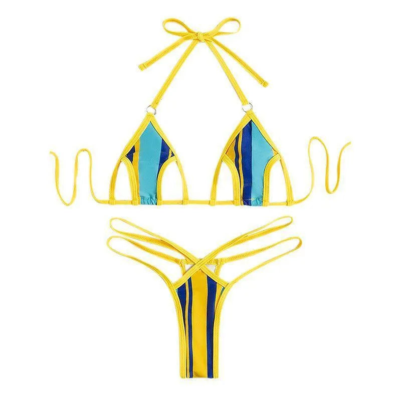 Yellow women's two-piece swimsuit with high-waisted shorts and a sleeveless, backless top on a neutral background.