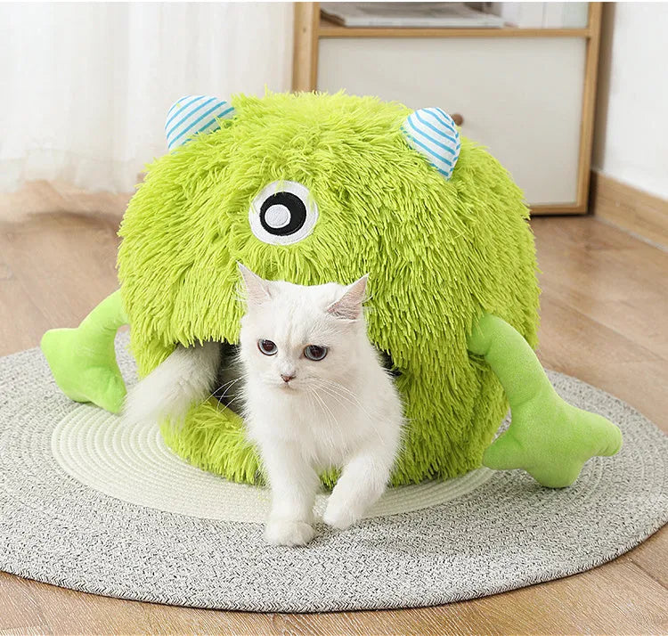 Round fluffy cat bed for indoor cats with self-warming feature and non-slip base