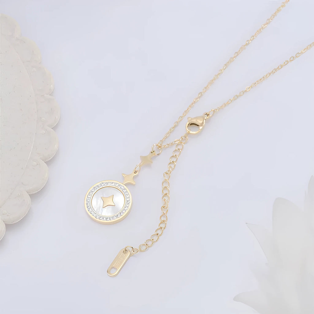 Geometric six-pointed star titanium steel necklace on a model, showing rose gold and gold colour options.