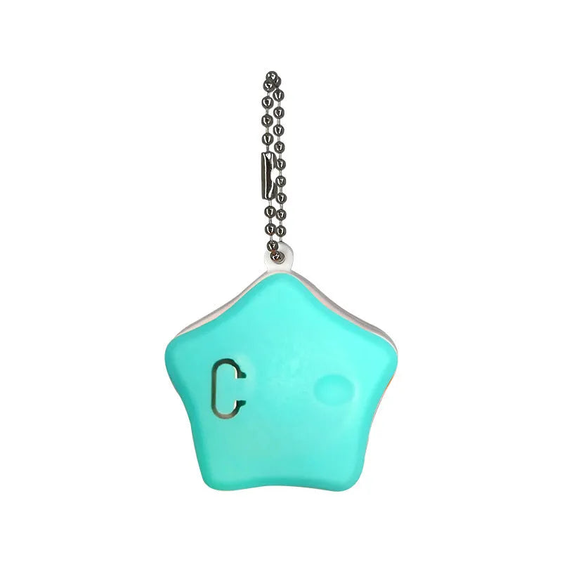 Blue rechargeable silicone pet pendant light attached to a dog collar for night walking.