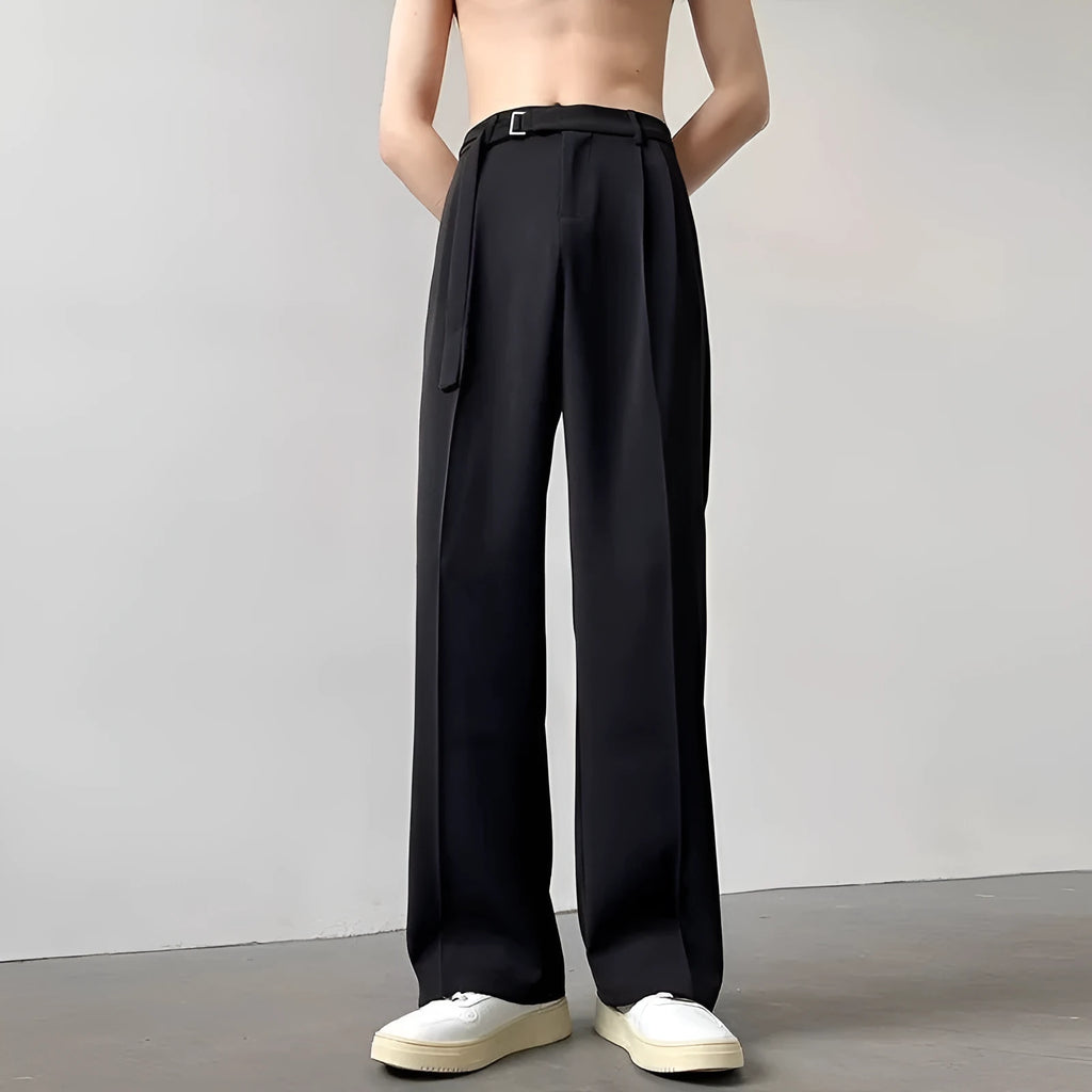 Black thin straight wide leg casual trousers with a loose fit and straight leg opening.
