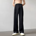 Black thin straight wide leg casual trousers with a loose fit and straight leg opening.