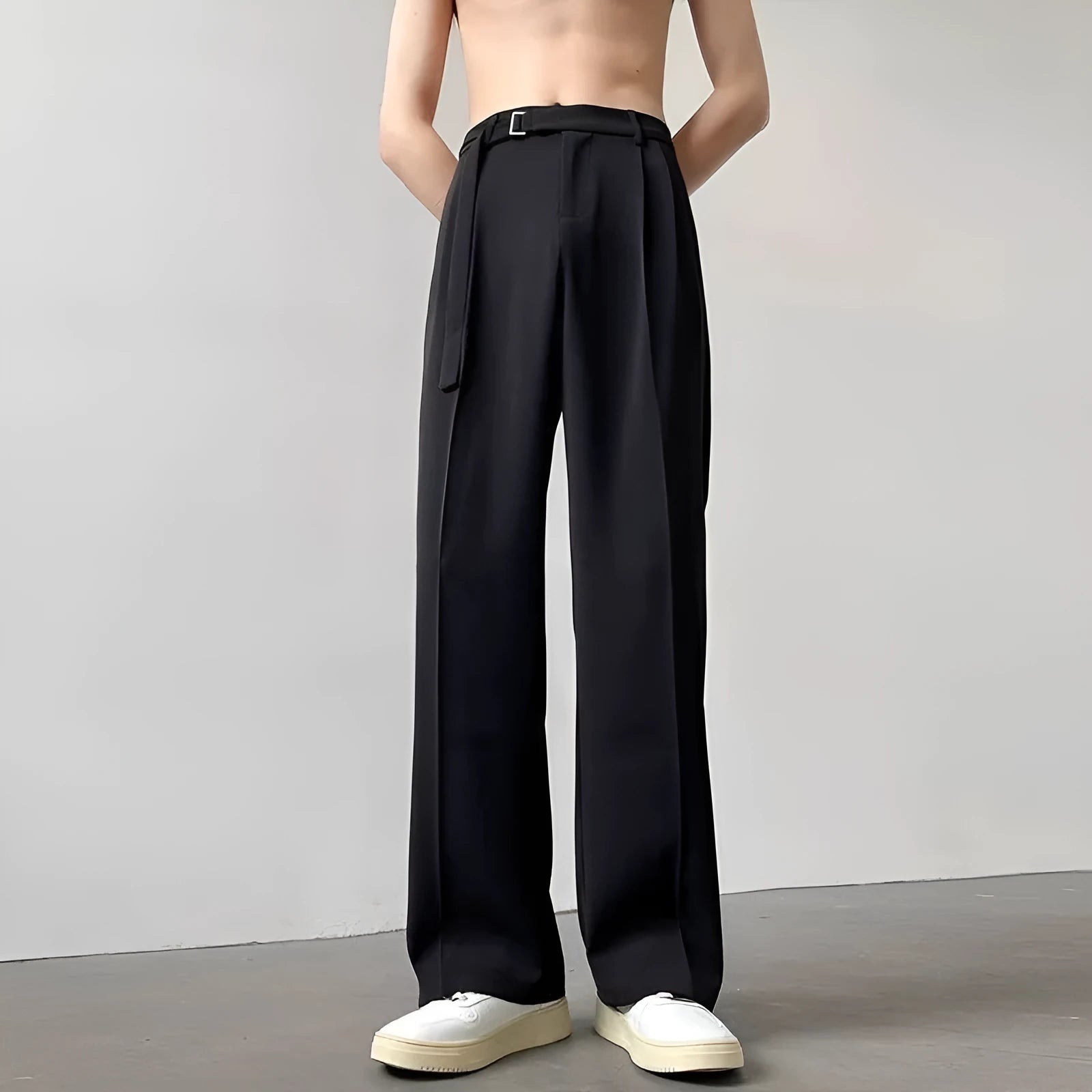 Black thin straight wide leg casual trousers with a loose fit and straight leg opening.