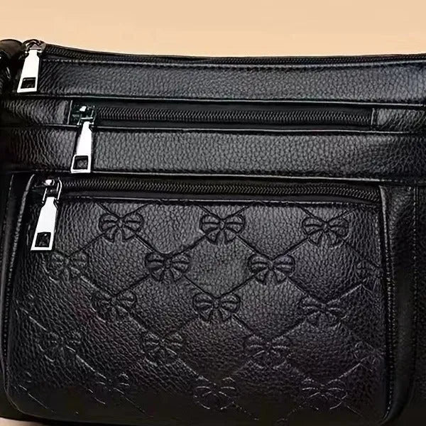 Butterfly black women's crossbody bag with embossed PU leather and horizontal square design