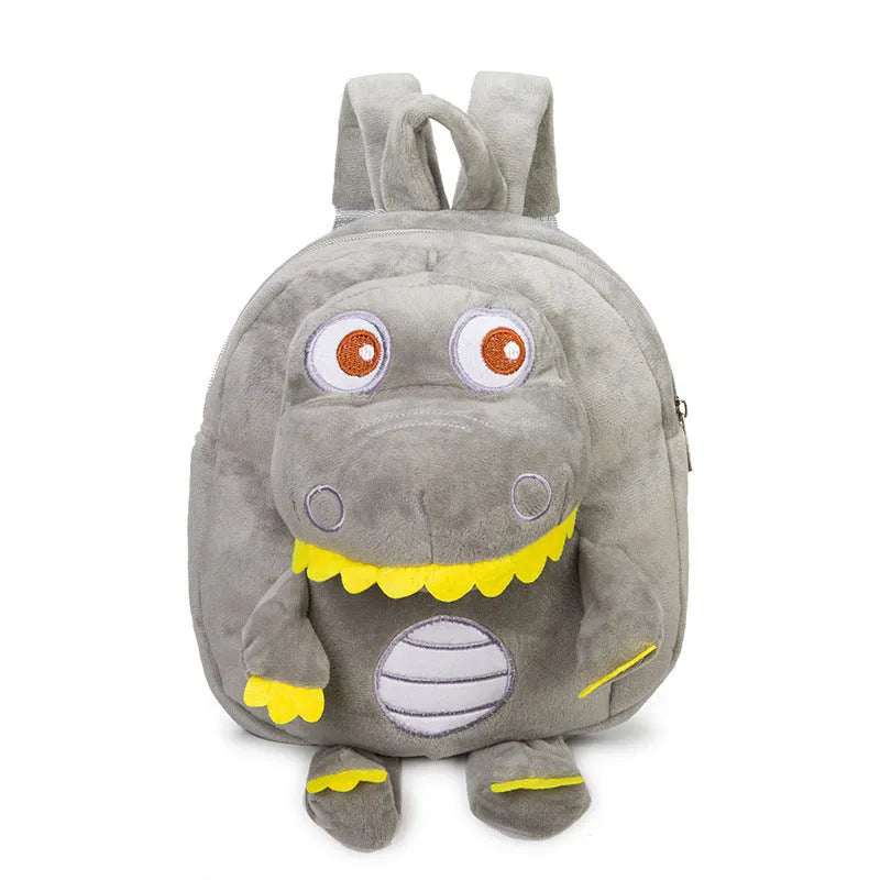 Dinosaur plush backpack with soft handle and embroidery details in children's backpack style