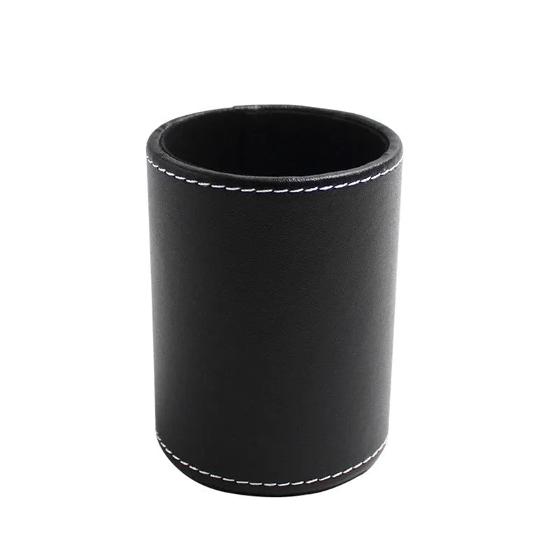 Round black leather pen holder container showing cylindrical shape and compact dimensions