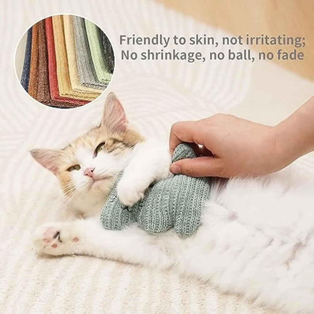 Cyan and light coffee coloured plush catnip chew toy with bell on a neutral background
