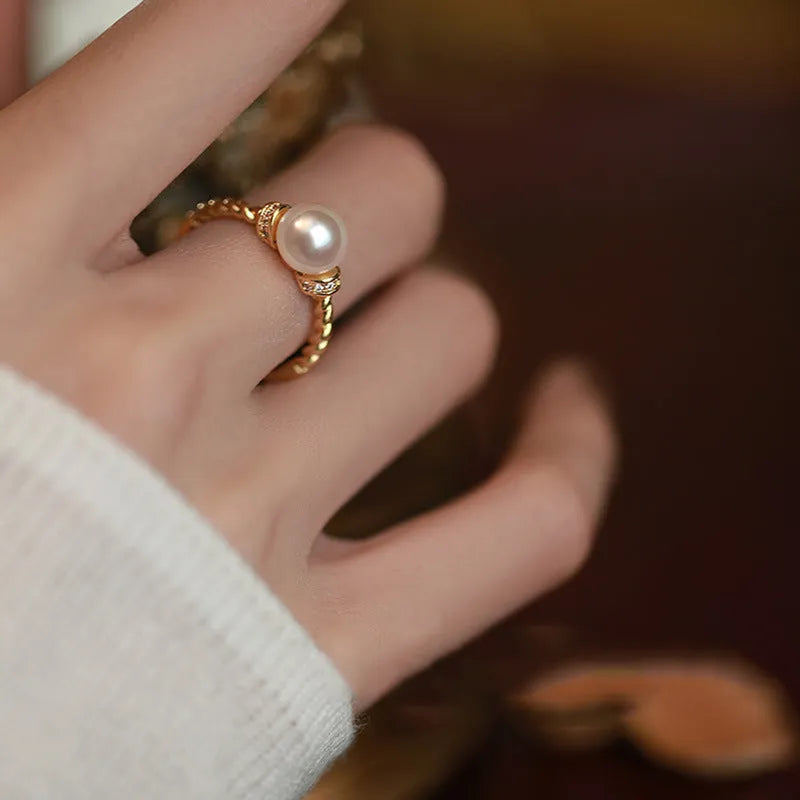 Antique twist pearl ring with geometric design and adjustable copper band