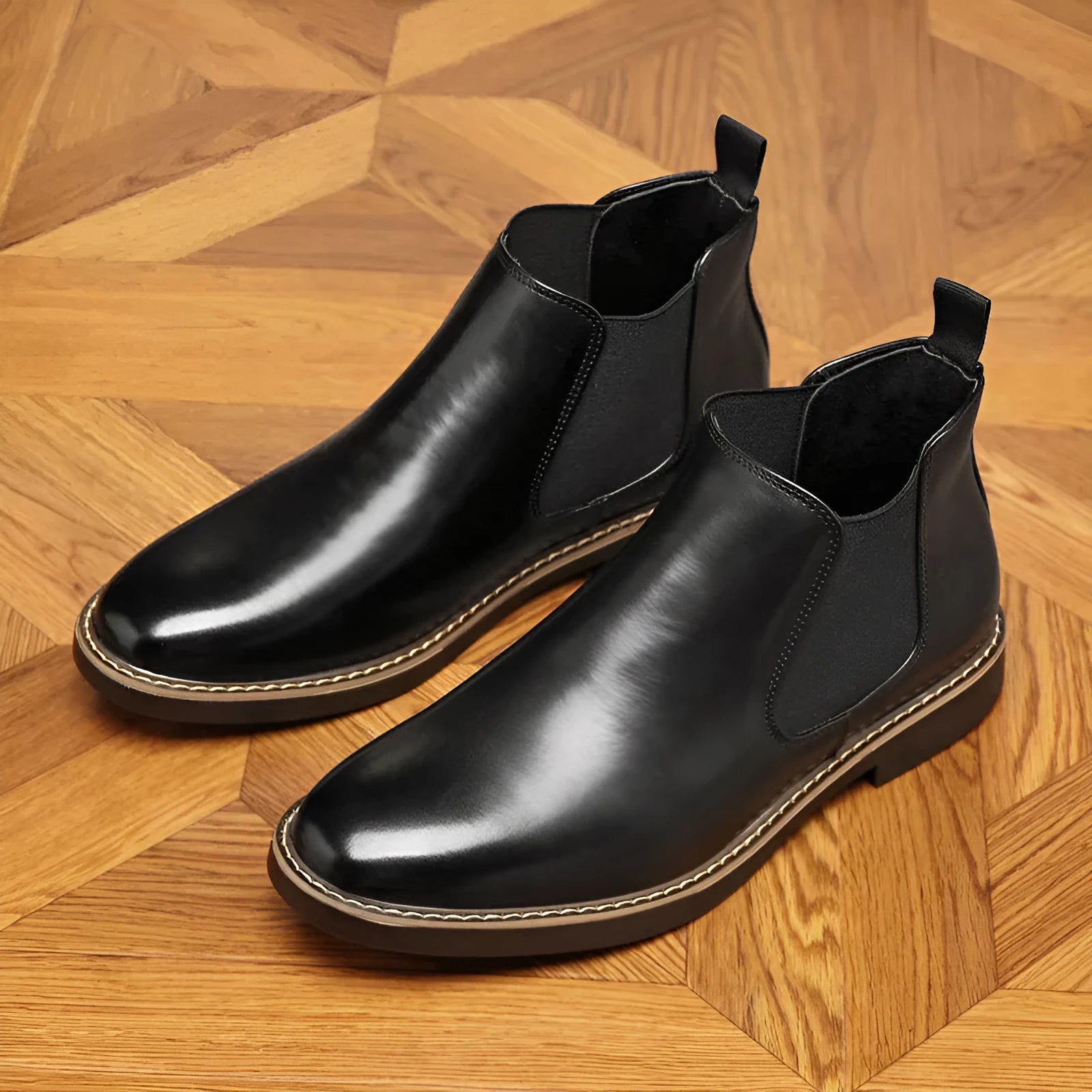 Men's black formal leather boots with pointed toe design and square heel on wooden floor