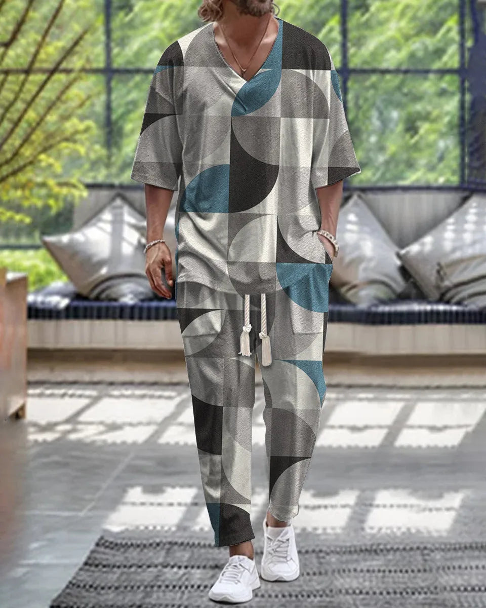 Mens grey cropped sleeve V-neck jacket and matching trousers suit on a hanger.