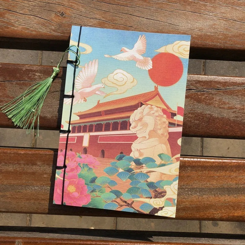 A5 antique wire-bound notebook with retro painting cover, thread binding, and black tassels.