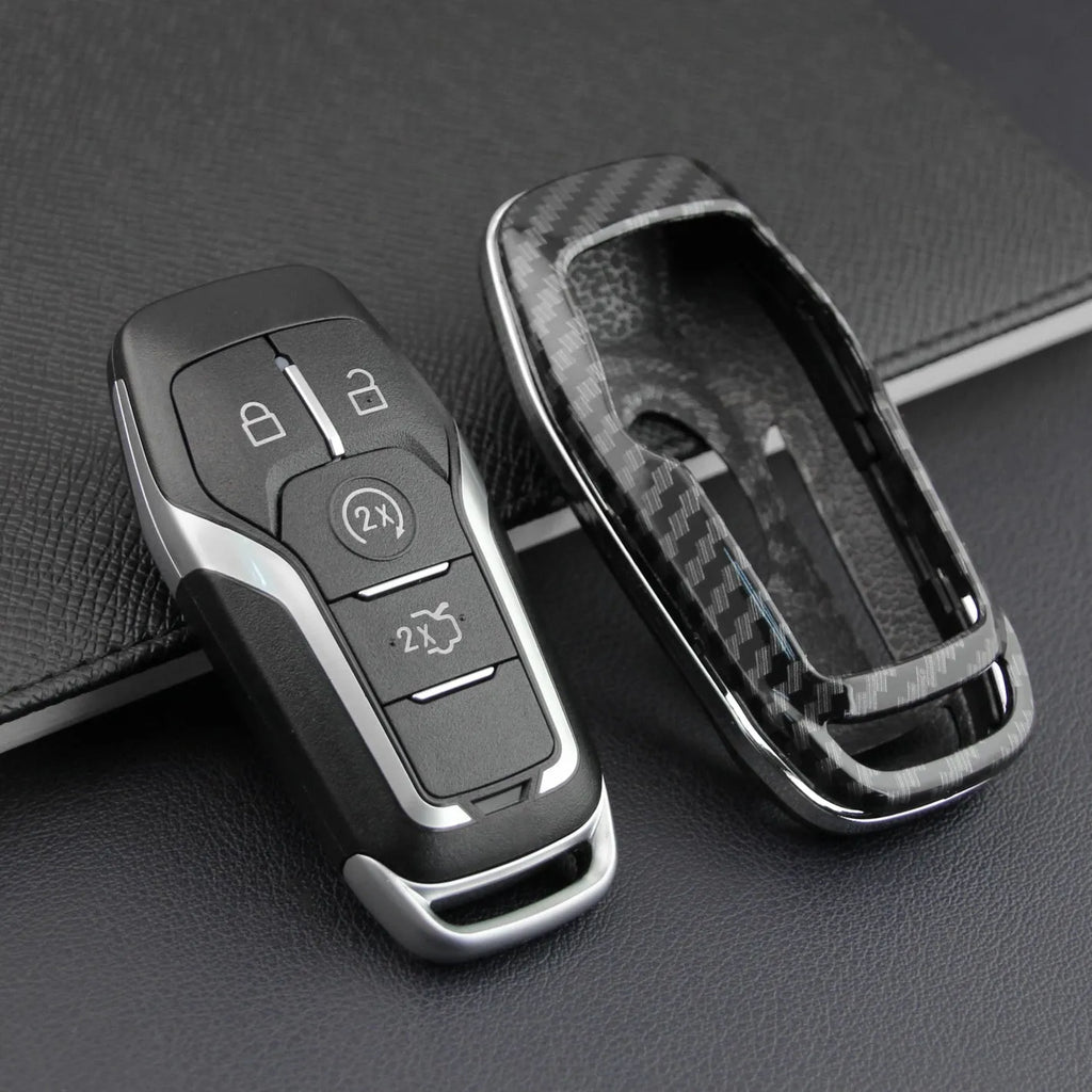 A plastic protective shell for a car key remote, shown in a single-piece design with an optional buckle attachment.