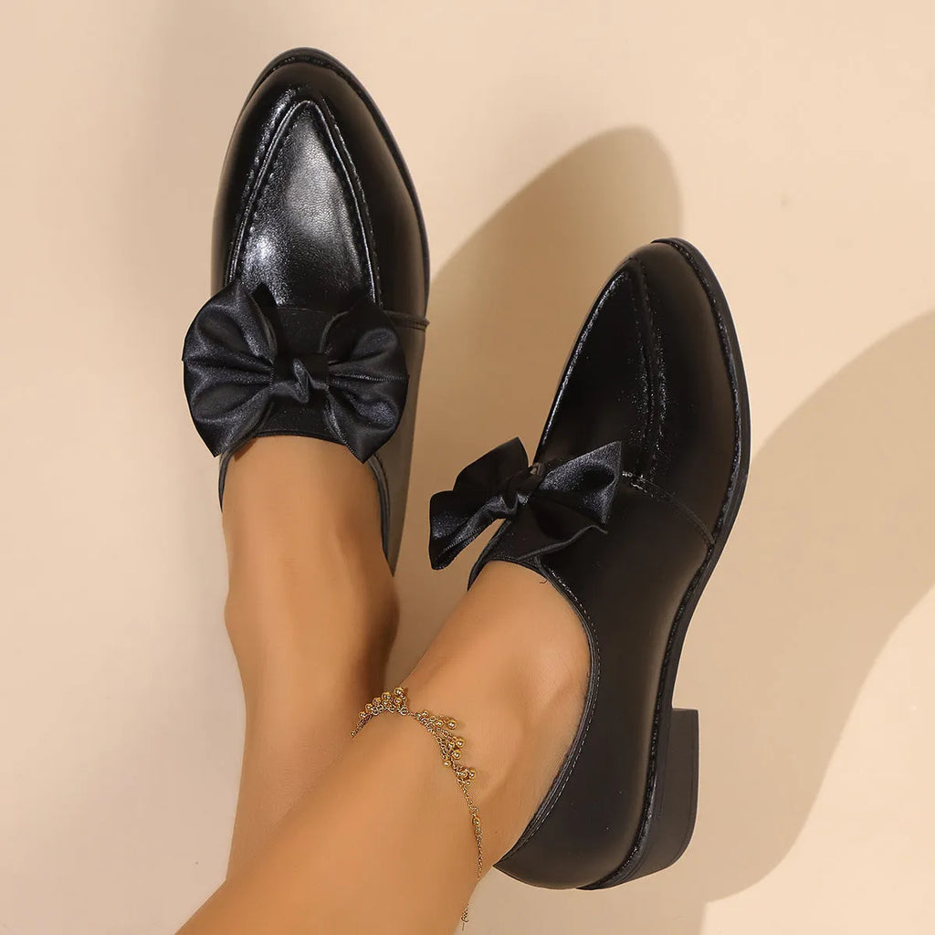 Women's simple leather-look shoes with a decorative bow on the front, showing choice of big bow or small bowknot designs.